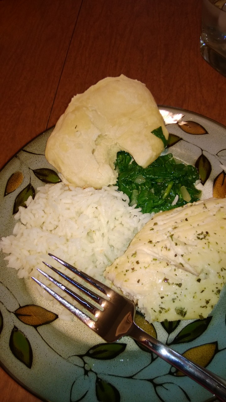 Chicken, Buttered Rice, Spinach, and Semi-Pita Bread.