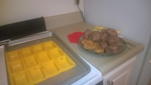 Mini loaves of two types of bread and a mini-loaf silicone sheet